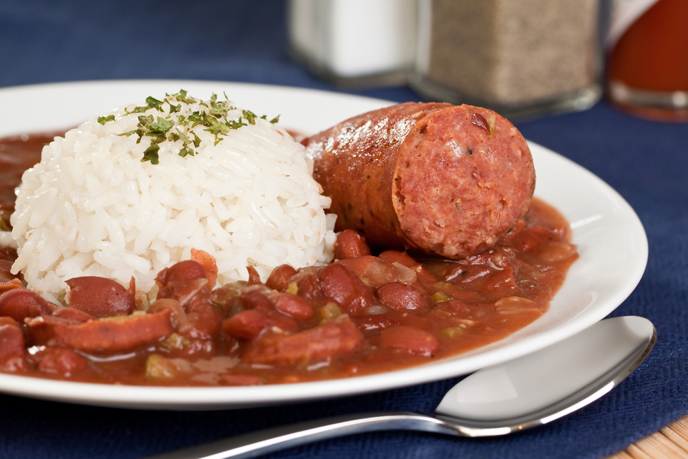 A plate of red beans, rice, and sausage