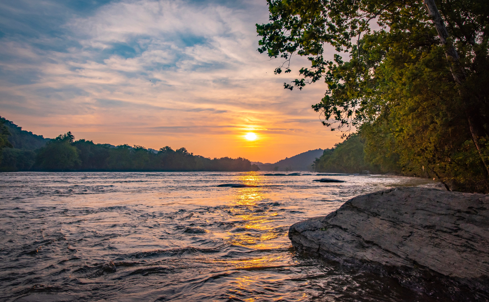 beautiful image of a sunset off the coast of the river in Harpers Ferry, WV!