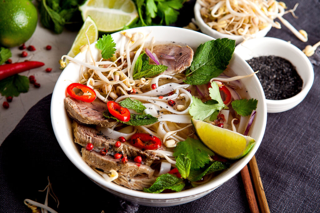 pho noodles and mint sprigs in Vietnamese cuisine