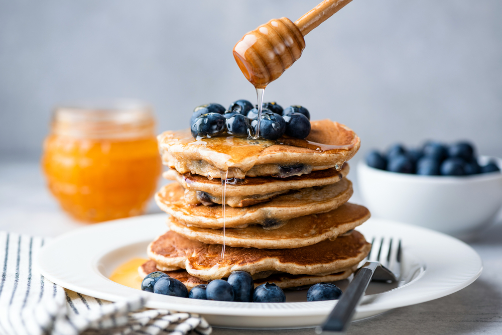 a beautiful stack of blueberry buttermilk pancakes; a great option for the best brunch in Dallas!