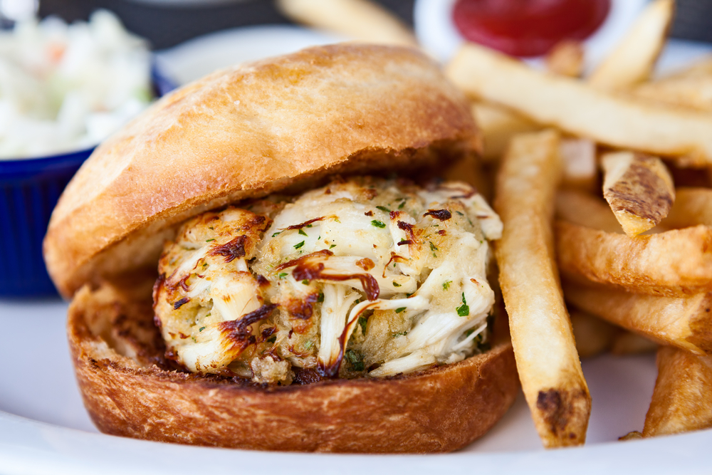 a diner crab cake sandwhich with fries 