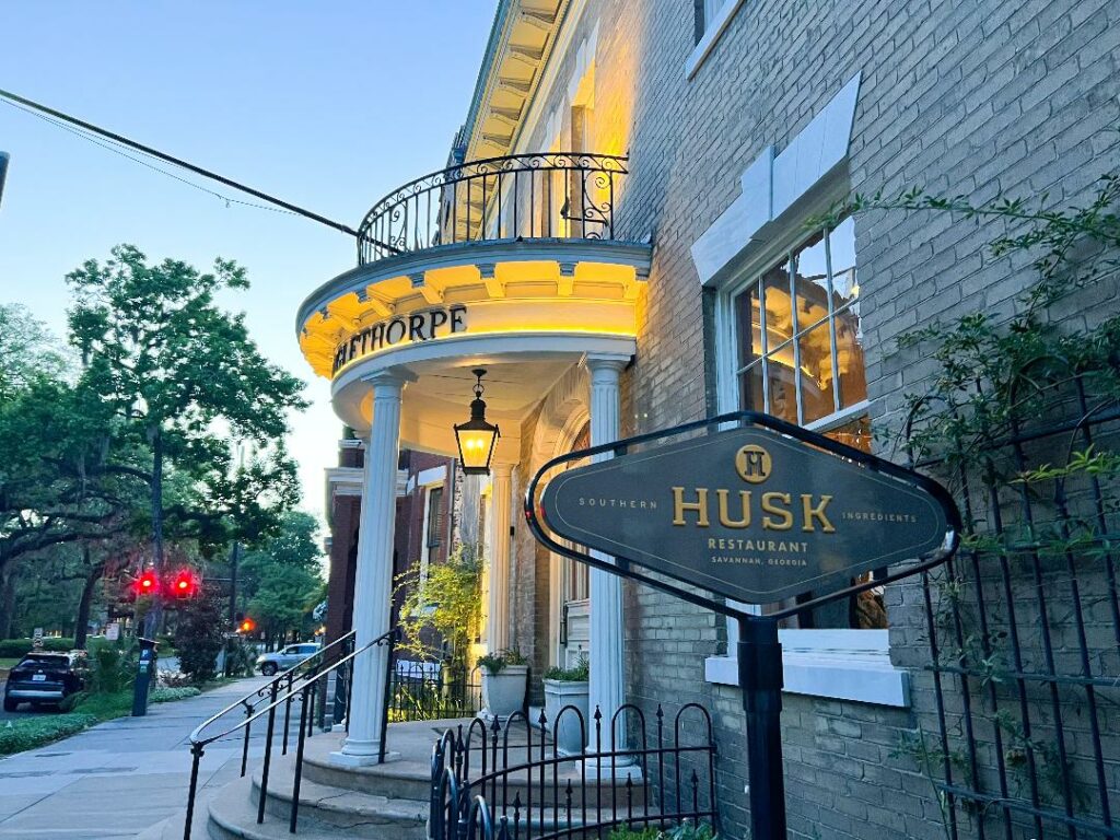 Dusk over the historic building housing the Husk Restaurant.