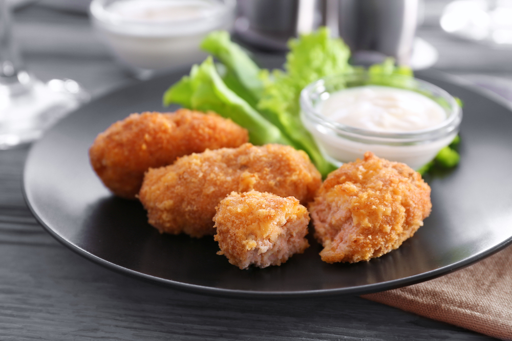 A plate of crispy fish croquettes.