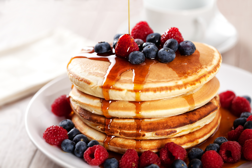 fluffy pancakes with fruit toppings is one of the best brunch In Charleston sc