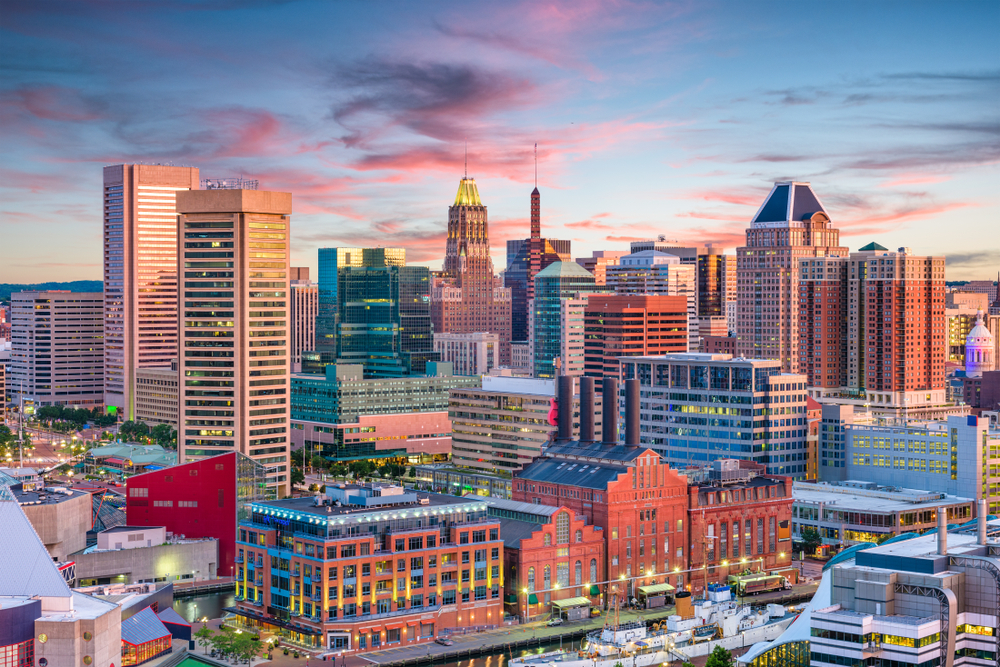 great aerial image of the Baltimore skyline with it's skyscrapers and everything at dusk!