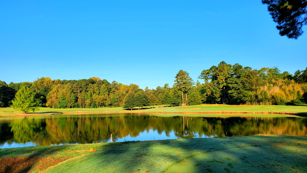 a view of a lake on a golf course in Georgia 