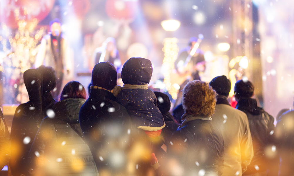 a group of friends enjoying the Christmas Jam in Asheville North Carolina 