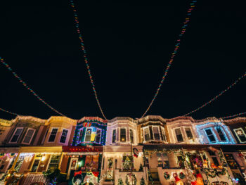 christmas lights on row houses in baltimore at night