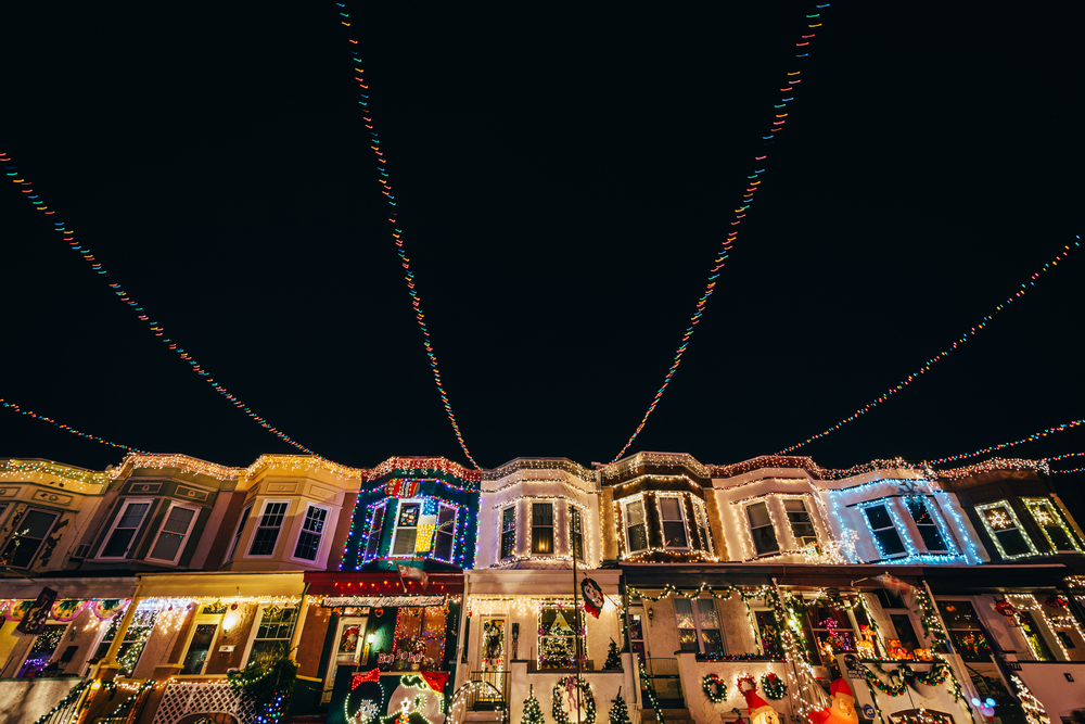 christmas lights on row houses in baltimore at night