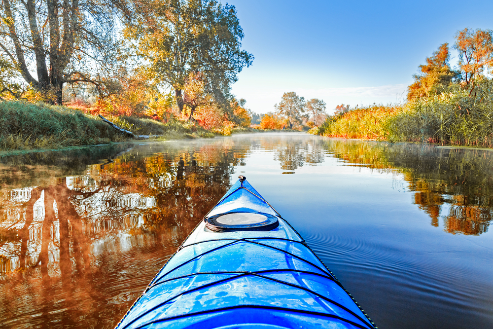 kayaking down the river in virginia when the leaves are changing colors 