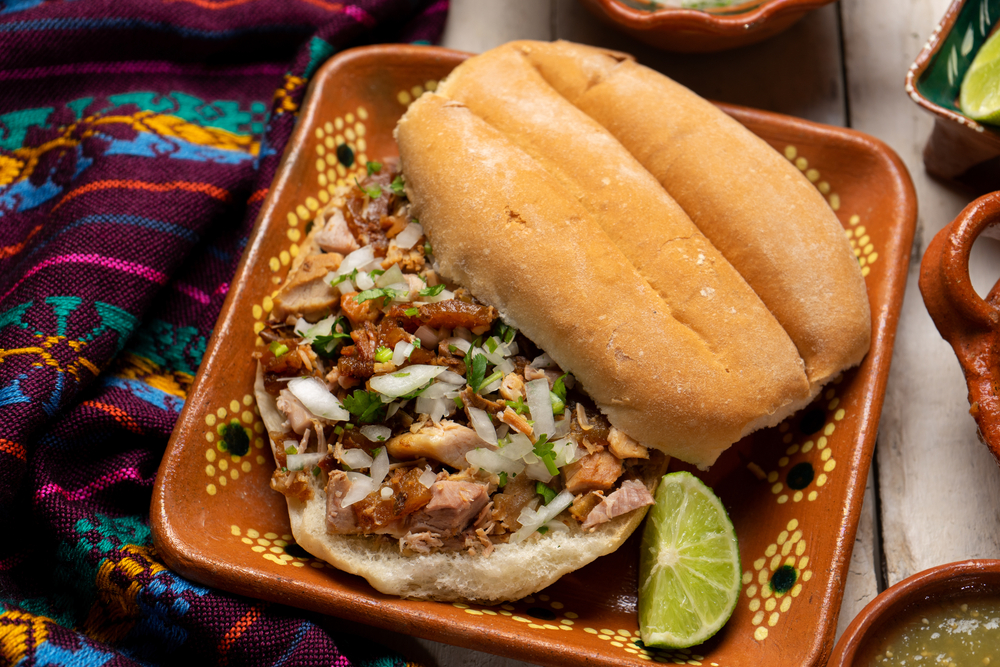 Carnitas torta with onions and cilantro at Tlaloc, one of the best restaurants in Athens GA!