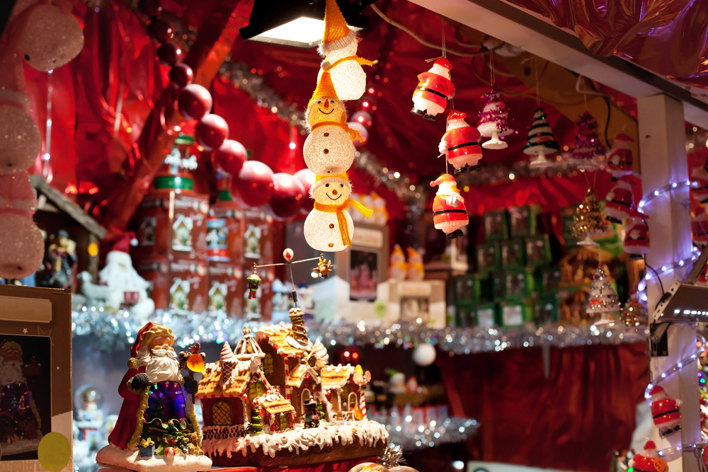 booth that might be found at the Charleston Christmas market, filled with ornaments and Christmas specific knickknacks like snowmen decorations