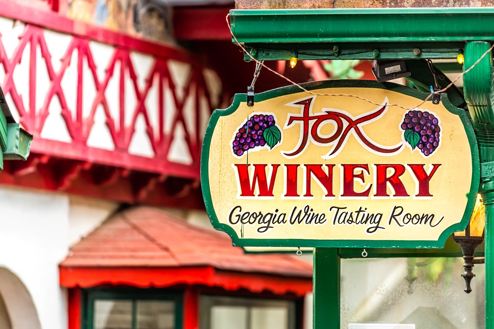 a beautiful green sign saying fox winery in Helen, GA 