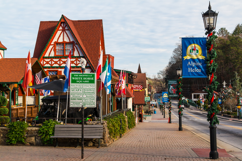 A sidewalk and colorful Bavarian architecture in Helen, one of the best Christmas towns in Georgia.