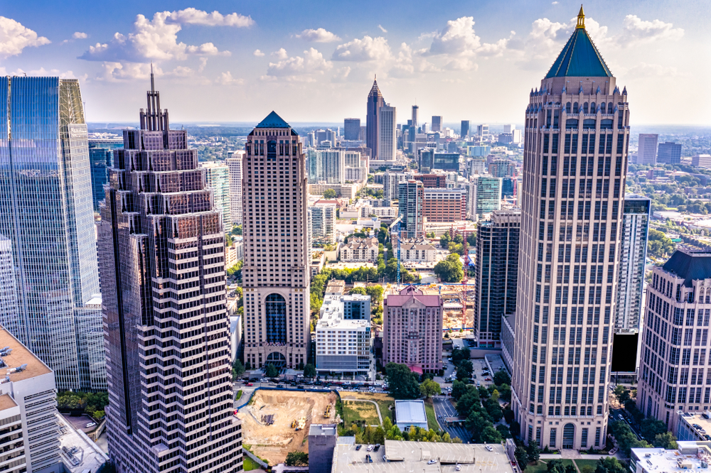 downtown Atlanta GA from above, clouds in the sky in the background 