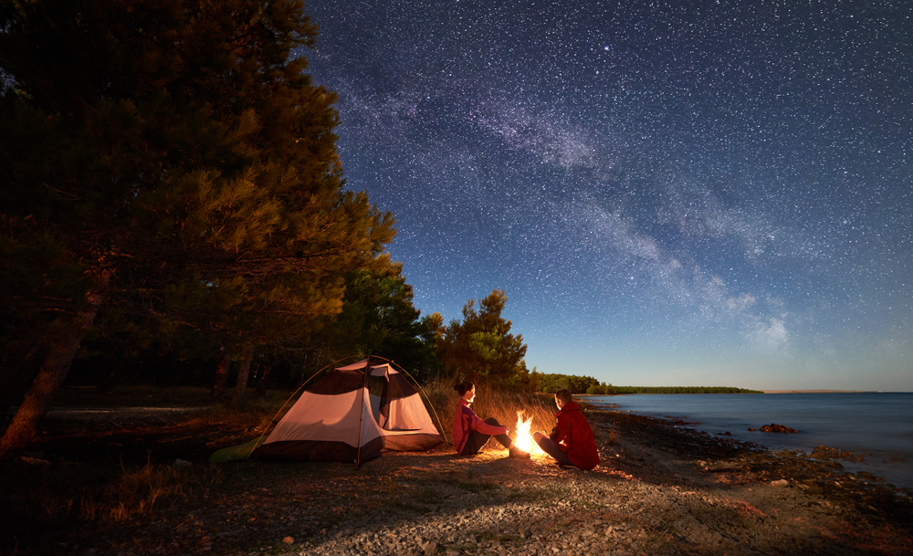 the stars in the sky along the North Carolina camp site with a pretty orange tent 