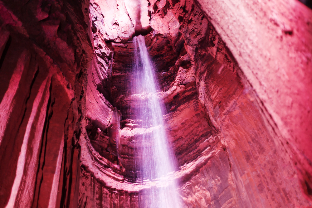 the ruby falls with red rocks and the underground cascade. this is one of the top attractions to see when visiting lookout mountain 