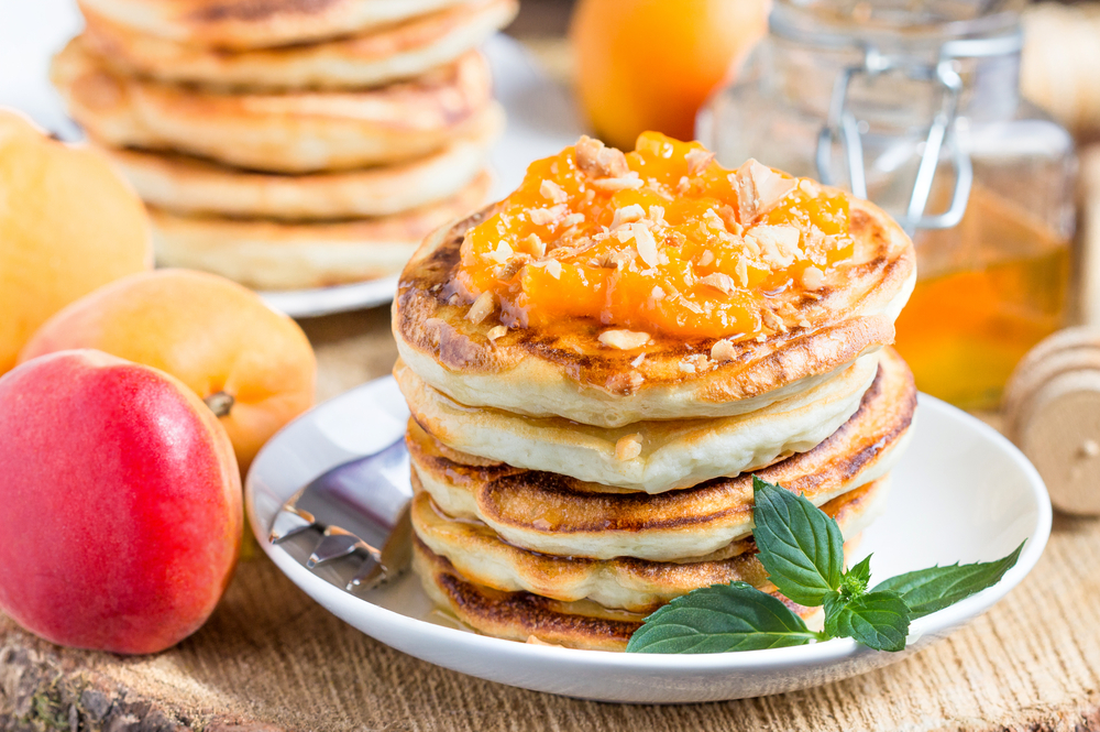 Pancakes made from the pancake mix at Lane Southern Orchard covered in peaches!