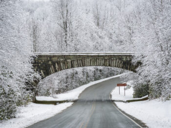 a beautiful snow covered bridge in the middle of Boone in winter!