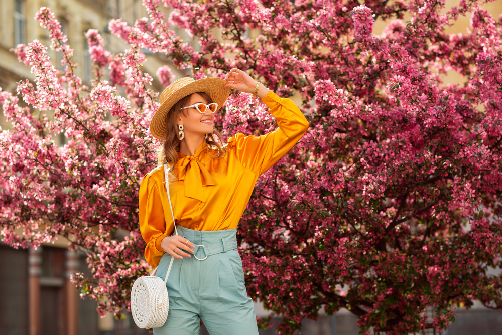 a girl in front of the cherry blossoms