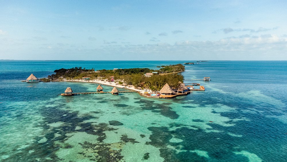 Island surrounded by overwater bungalows 