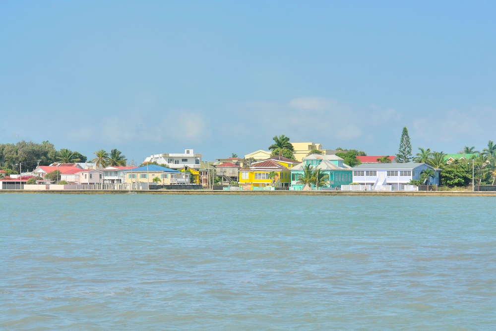 View of Belize city from the Caribbean sea. The article is about cheapest places to fly from Houston.