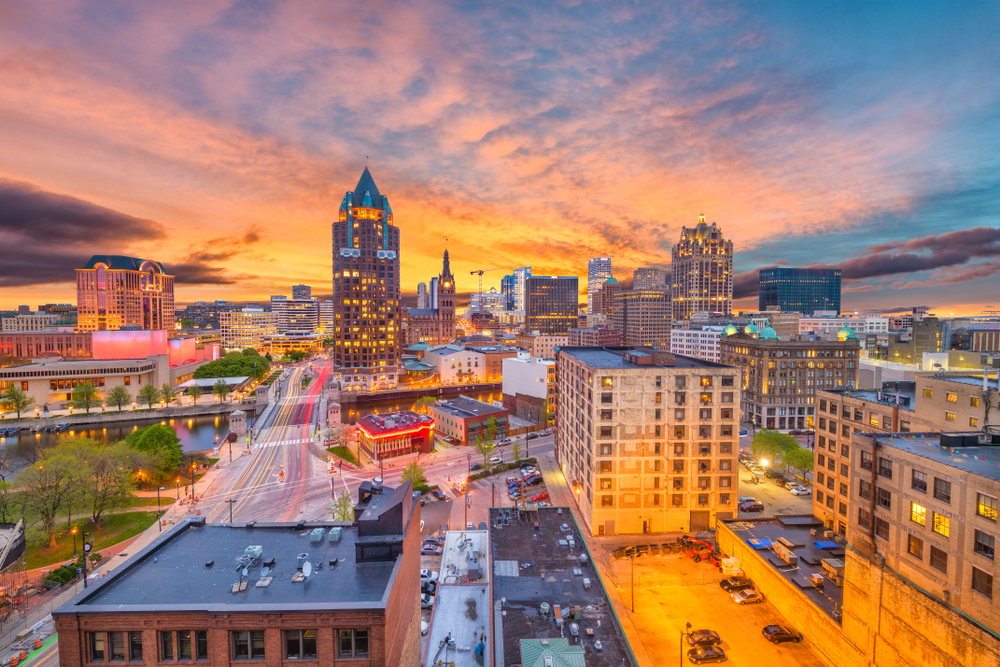 Milwaukee, WIsconsin, USA downtown skyline at dusk. This article is about cheapest places to fly from Nashville.