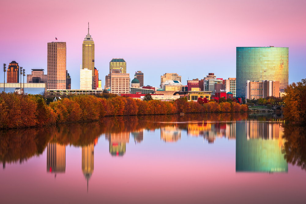 Indianapolis, Indiana, USA skyline on the White River at dusk. 