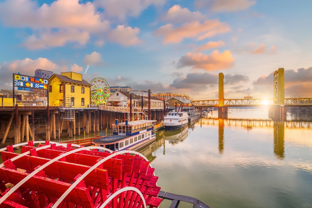 Old town Sacramento city skyline with Tower Bridge, cityscape of California in USA. One of the cheapest places to fly from Nashville